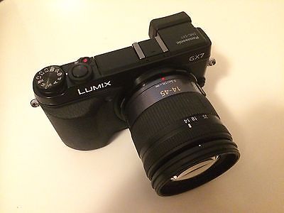 Panasonic LUMIX DMC-GX7 + Objektiv / lens Panasonic 14 - 45 mm + viele Extras 