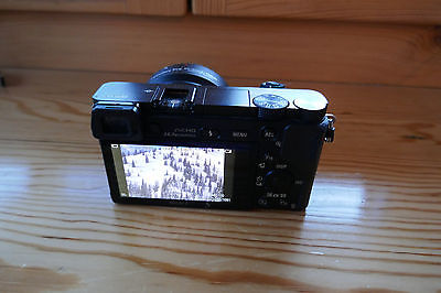Sony Alpha 6000 24.3 MP Digitalkamera mit Konverter für EF Objektive