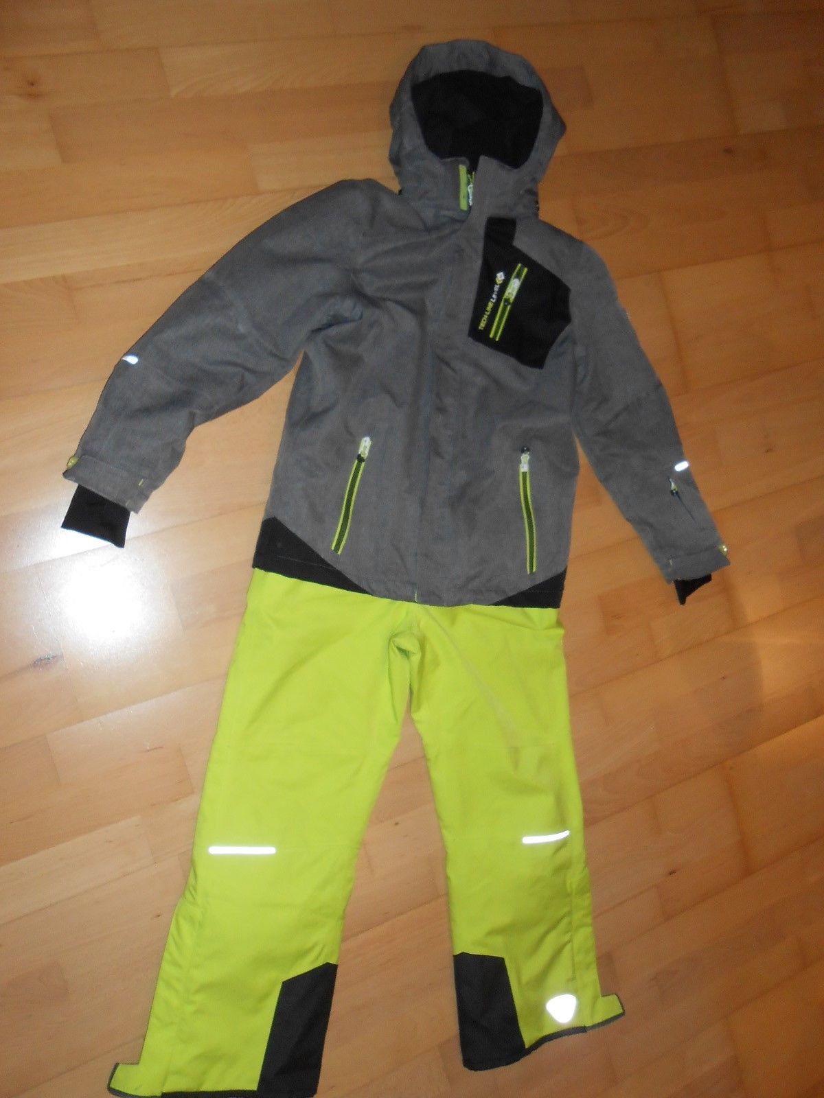 Jungen Skianzug Größe 152 von Killtec, graue Skijacke und gelb/grüne Hose
