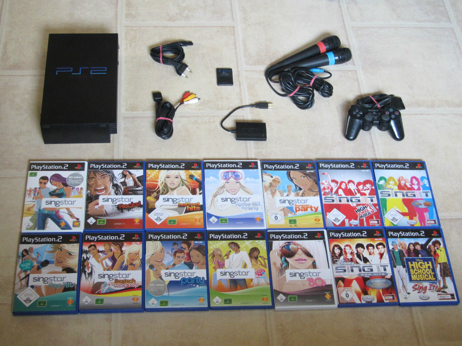 Playstation 2 komplett mit Controller + 4 Singstar Spiele + Micros + MC PS2 PS 2