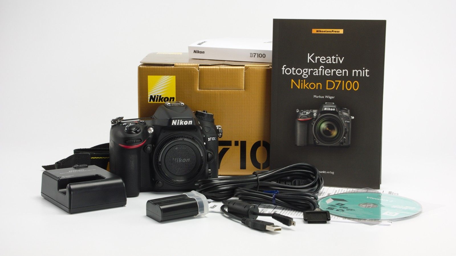 Nikon D D7100 24.1 MP SLR-Digitalkamera - Fernauslöser MC-DC2 Buch Zubehörpaket